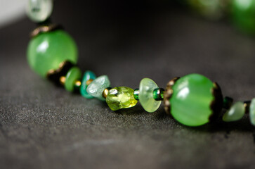 necklace of natural stones on the background of gem stones