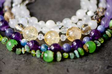 necklace of natural stones on the background of gem stones