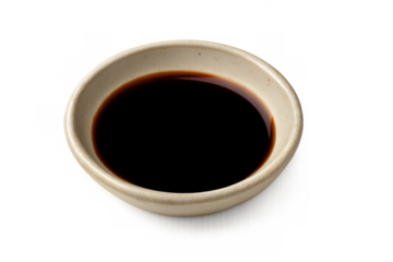 Small bowl containing soy sauce on transparent background