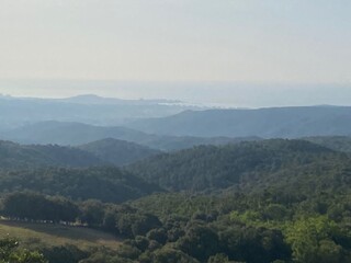 Mountain landscape with long view on the horizon to the Mediterranean Sea in Girona