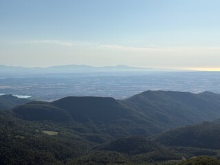 Mountain landscape with long view on the horizon to the Mediterranean Sea in Girona