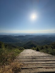 Mountain landscape with long view on the horizon to the Mediterranean Sea in Girona