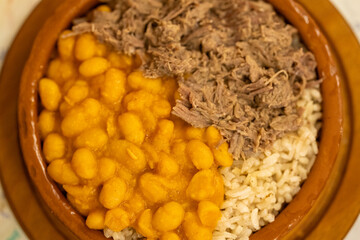 Black Sea regional beans, rice and roasted meat served in a local pot in turkey