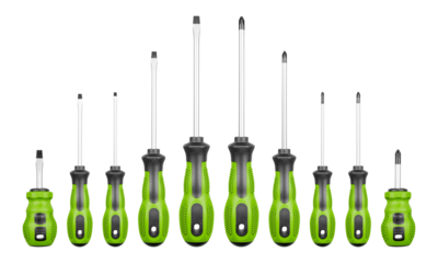 Set of Philips and flathead screwdrivers Green color on isolated white background close-up