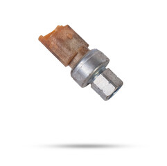 Oil pressure sensor of car isolated on white background. New spare parts.