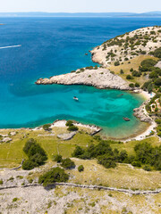 Scenic aerial shot of Stara Baška coastline on Krk island, Croatia. A joyful scene of summer leisure on Krk Island