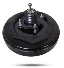 Black metal vacuum brake booster for repair and replacement on a car in a workshop on a white...