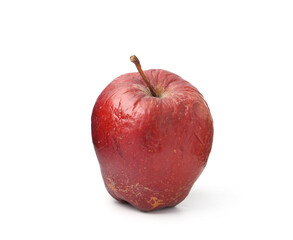 One whole rotten apple isolated on white