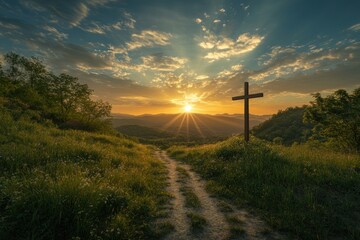 Obraz premium Wooden cross on a hilltop at sunrise