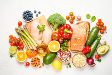 Healthy food assortment on white background.