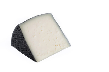 Close-up of a wedge of semi-cured cow's cheese isolated on white background