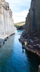 Breathtaking views of Studlagil Canyon with striking basalt columns in Iceland