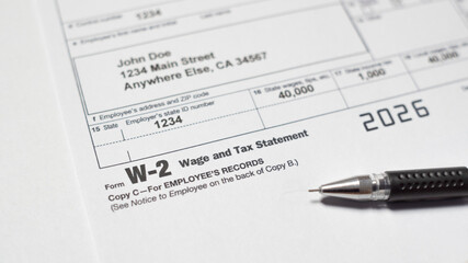 Tax document for the IRS W-2 Tax form in office or at home
