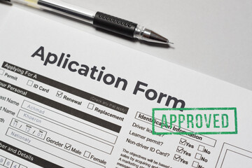 Fototapeta premium Application Approved Stamped Document Closeup