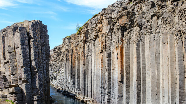 Majestic landscapes of Studlagil Canyon in Iceland showcasing towering basalt columns