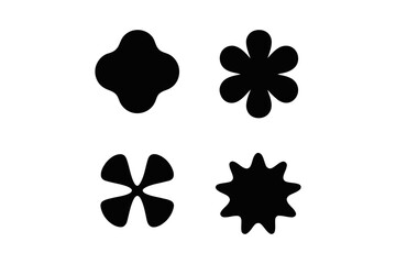 Four abstract black shapes on a white background