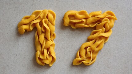 Number  shaped with pasta pieces on a kitchen counter, playful food design and space