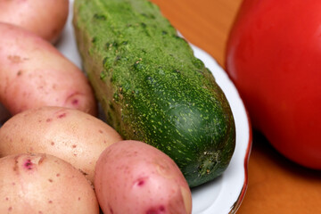 Fresh vegetables gathered in a rustic kitchen during summer season