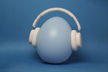 A light blue egg-shaped object wears light pink headphones, set against a solid blue background