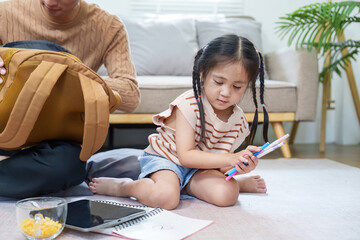 Father and Daughter Learning Together. Engaging in homework and creativity.