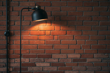 Industrial background, close up of an empty lotf apartment wall lit by the vintage lamp, with copy...