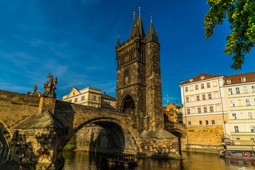A view along the east bank towards the start of the Charles Bridge in Prague in springtime