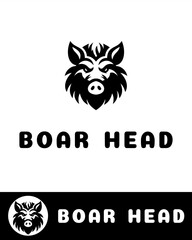 A bold and fierce boar head logo with sharp features and symmetrical design in black and white 