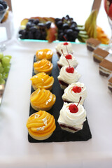 Beautiful sweet buffet with pastries, cakes and tartlets. Sweet desserts.