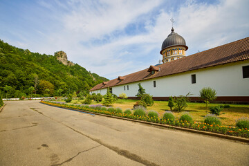 image from the outside of a church in Romania with paintings specific to the area and the Orthodox...