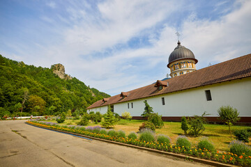 image from the outside of a church in Romania with paintings specific to the area and the Orthodox...