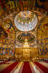 image from inside a church in Romania with paintings specific to the area and the Orthodox religion