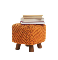 Stylish pouf with books isolated on white