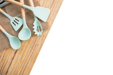 kitchen utensils on the bamboo mat	with empty edges transparent
