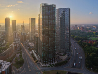 Aerial image of an urban sunrise over the Deansgate area of Manchester UK 