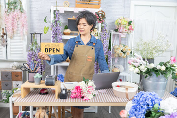 Senior, woman, florist, small business owner, entrepreneur feeling happy after getting order online...