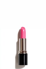 A pink lipstick isolated on white background.