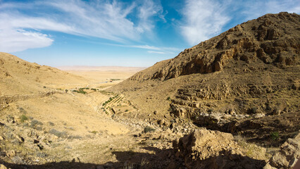 Vast Desert Landscape with Rocky Hills