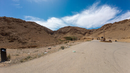 Desert Road Through Rocky Hills