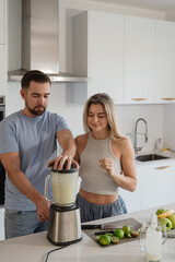  Couple Preparing Healthy Smoothie Together in Bright Modern Kitchen