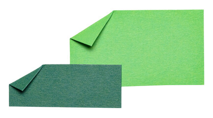 Two green overlapping isolated cut out blank paper notes cardboard with folded corner dog-ear earmark and copy space for text, transparent png background design element
