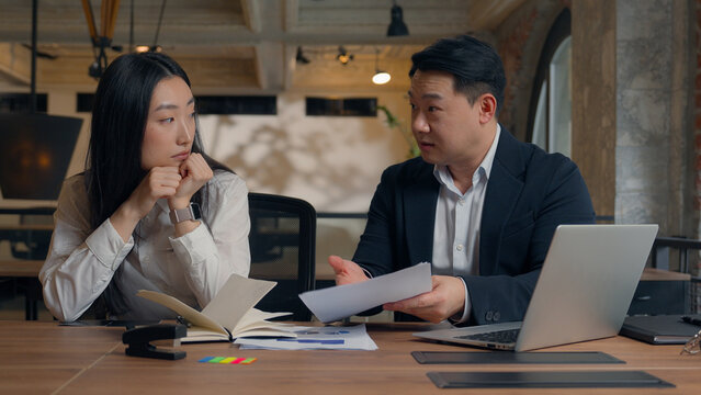 Bad aggressive CEO boss business man Korean Asian guy male leader angry talking documents stress rude yelling hate work female Japanese Chinese girl intern woman businesswoman female office coworker