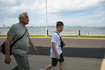 Active Senior Man Traveling  in New York City.  A 75-year-old man explores the streets of New York City, embracing adventure and independence in his golden years.