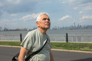Active Senior Man Traveling  in New York City.  A 75-year-old man explores the streets of New York City, embracing adventure and independence in his golden years.