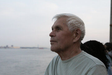 Active Senior Man Traveling  in New York City.  A 75-year-old man explores the streets of New York City, embracing adventure and independence in his golden years.