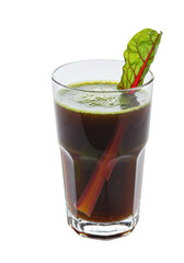 Fresh green juice in a glass with leafy greens, showing a healthy drink for well-being