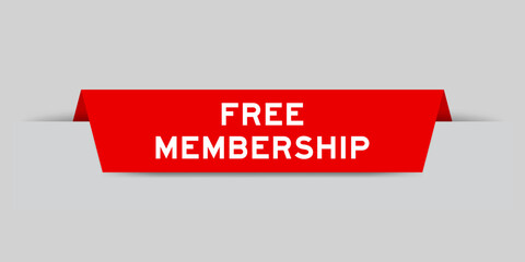 Red color inserted label with word free membership on gray background