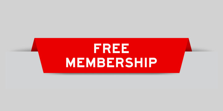 Red color inserted label with word free membership on gray background
