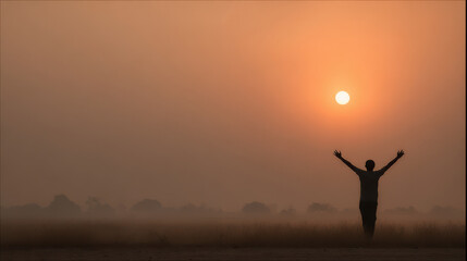 jubilant portrait of person celebrating milestone with stunning sunset in background