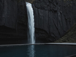 Serene Waterfall Cascading into a Tranquil Pool
