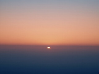 Serene Sunrise A Breathtaking Panorama of the Sun Rising Above the Horizon
